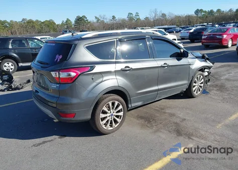 2017 Ford Escape Titanium z USA, uszkodzony, nr VIN 1FMCU0J95HUF01691